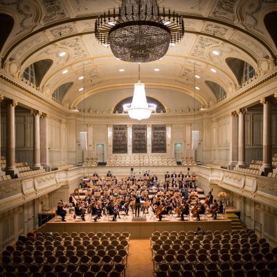 Orchestra performing in a concert hall